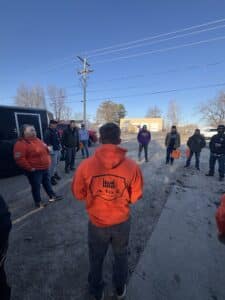 Fence installation training morning huddle as a full day of training begins